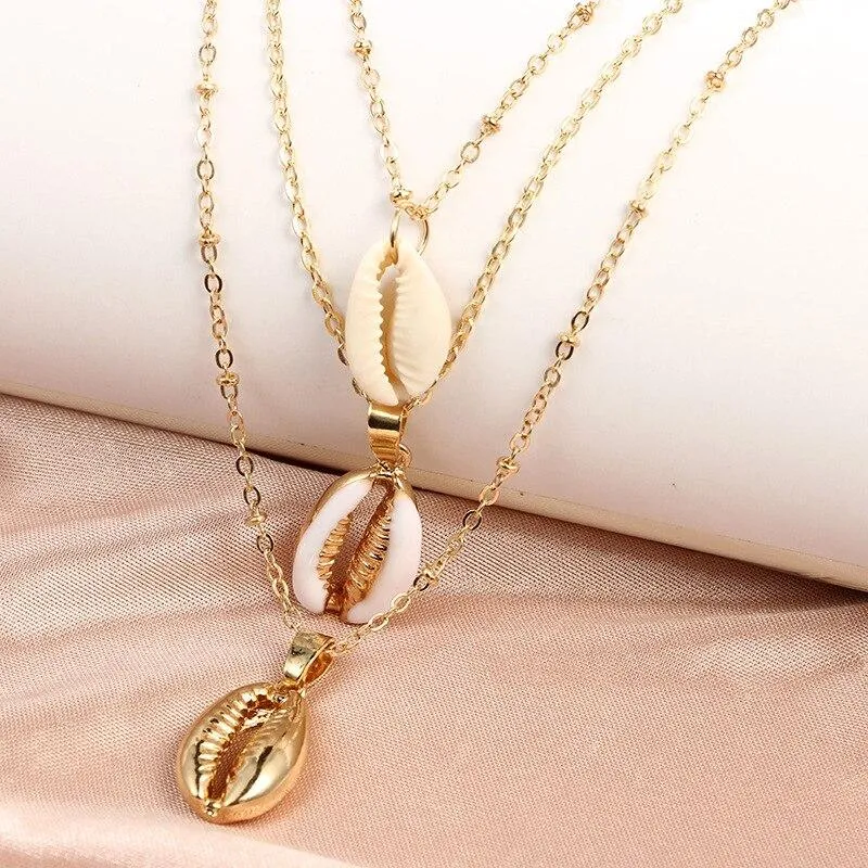 Multilayer Golden Chain Necklace with Puka Shell Pendants