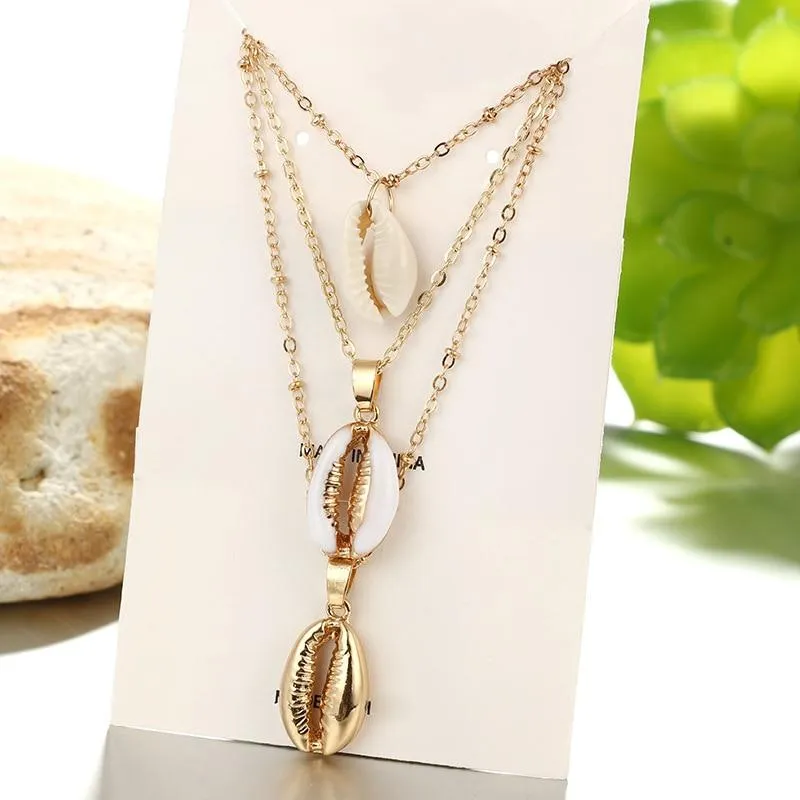 Multilayer Golden Chain Necklace with Puka Shell Pendants